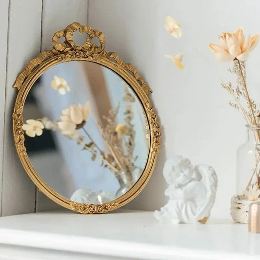 ROUND PEWTER MIRROR0